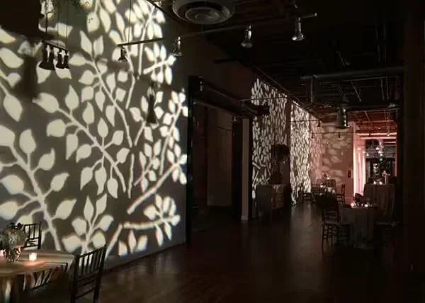 Texture pattern wedding lighting adding ambiance to South Asian reception venue